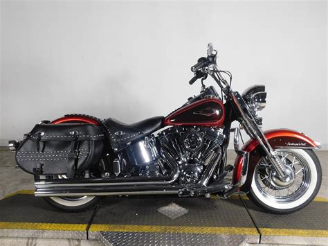 Blazing from the past with original dresser spirit and modern touring capabilities. Pre-Owned 2013 Harley-Davidson Softail Heritage Classic ...