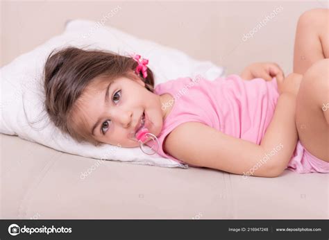 Portrait Cute Girl Lying Bed Stock Photo By ©epicimages 216947248