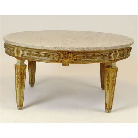 Mid 20th Century Italian Carved And Parcel Gilt Wood Coffee Table With