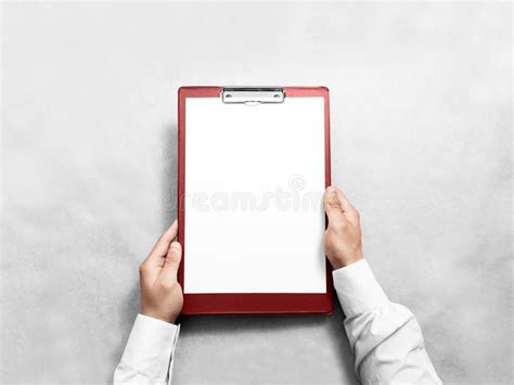 Hand Holding Blank Red Clipboard With White Paper Design Mockup Stock