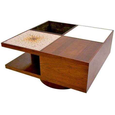 This coffee table with a lift top offers a spacious top surface that lifts up and towards you for multifunctional space to work on projects, browse the web, or enjoy a delicious meal while relaxing on the couch after a hard day of work. Multifunctional Coffee Table by Vladimir Kagan For Sale at ...