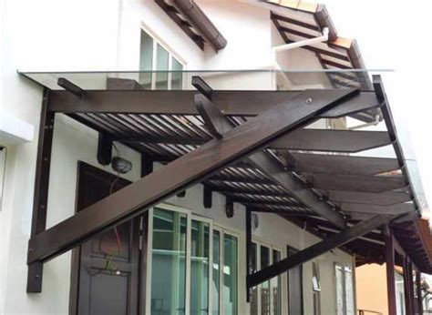 Glass awnings are typically used outside buildings to protect people from weather conditions without blocking natural light. LKN One Stop Centre: PERGOLA (Glass)