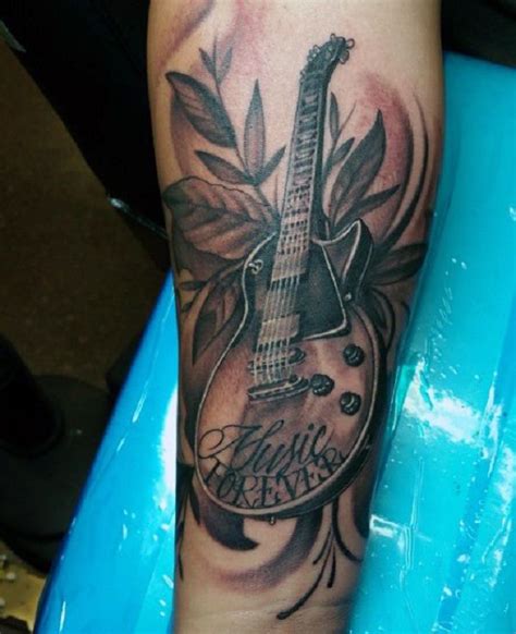 Check out our tats gallery of the best images here. 60 Inspirational Guitar Tattoos | Guitar tattoo, Music tattoo sleeves, Tattoos for guys