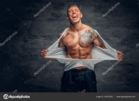 Athletic Man Ripping T Shirt Stock Photo By ©fxquadro 150707522