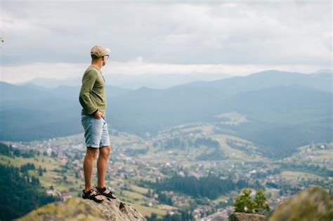 Premium Photo Lifestyle Summer Portrait Of Man Standing On Top Of