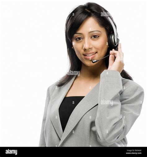 Portrait Of A Female Customer Service Representative Smiling Stock