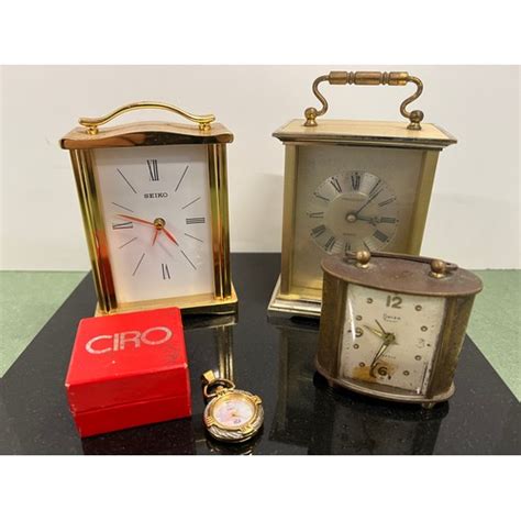 Three Carriage Clocks By Seiko Quartz President Quartz And Barnebys