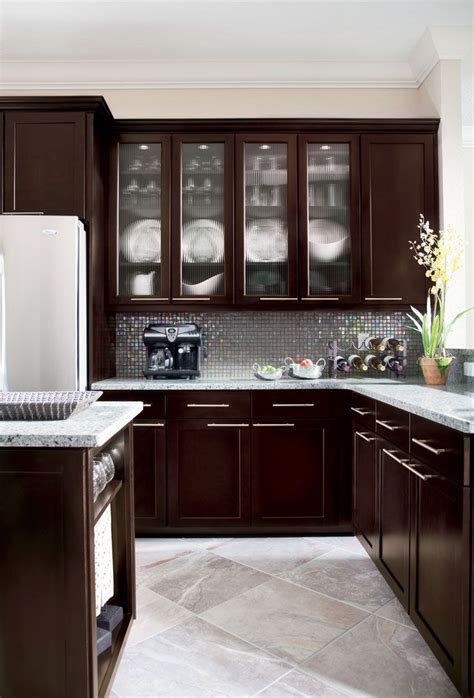 Tumbled natural stone slate and tiles are also perfect for fitting in with any kitchen decor. Dark cabinets, light granite, light gray tile | Kitchen ...