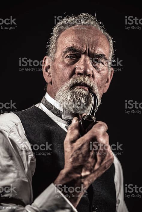 Pipe Smoking Vintage Characteristic Senior Man With Gray Hair Stock