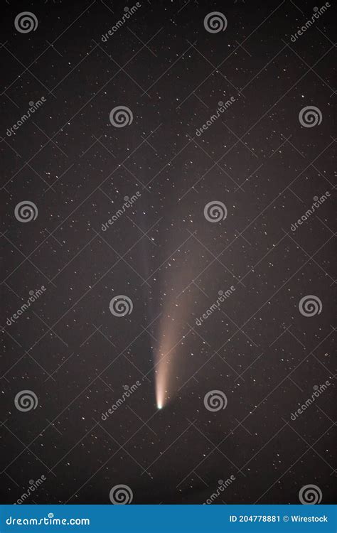 Bright Comet Neowise Shining In The Starry Night Sky Great For