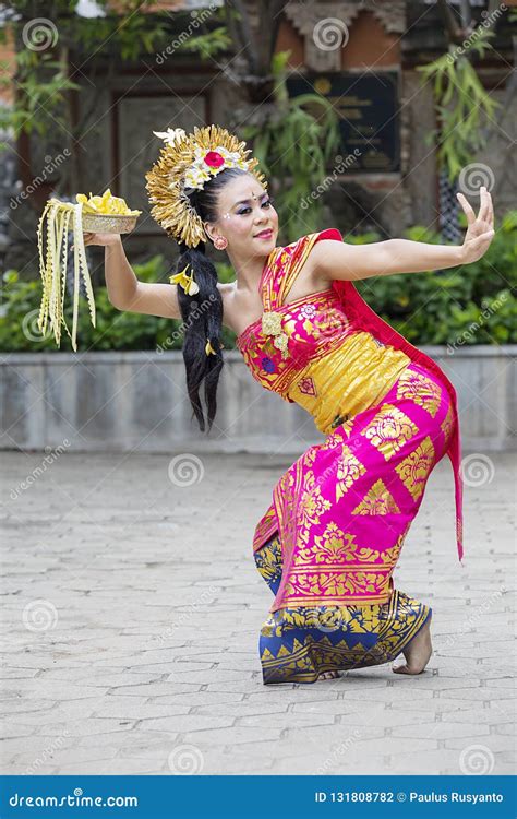 Beautiful Dancer Performing Traditional Balinese Dance Stock Photo