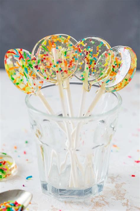 Pour caramel on to a greased baking tray. Sprinkle Lollipops | Recipe | Hard candy recipes, Lollipop ...
