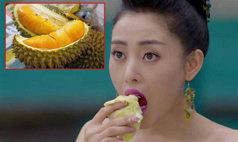 chinese woman devours two durians on the spot after being stopped from taking the fruits on the