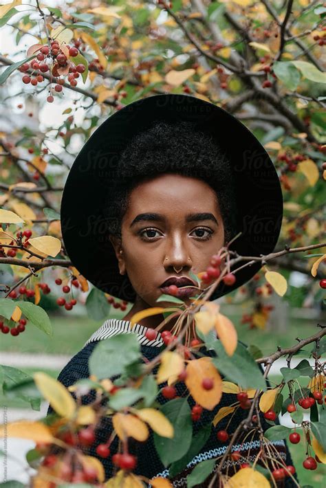 A Beautiful Young African American Woman Outside On An Autumn Day By