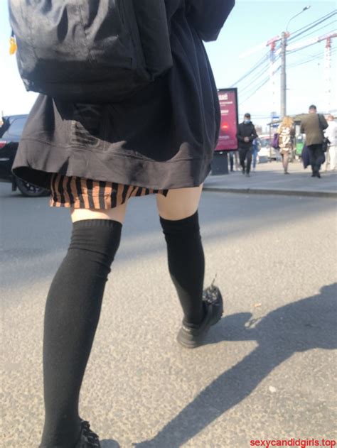 Legs In Knee Socks And A Skirt Young Girl Passing By On The Street Sexy Candid Girls