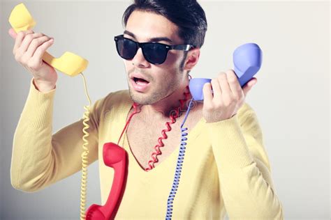 Funny Call Center Guy With Colorful Phones Stock Image Image 26607241