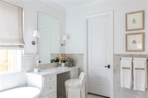 If you are renovating an old bathroom, then this is the best time to create a new tile design on your bathroom floor, backsplash, wall, or shower. White and Gray Bathroom with Gray Half Tiled Walls ...