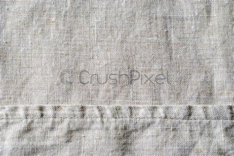 Gathered And Folded Texture Of Woven Linen Fabric Stock Photo