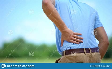 Male Feeling Sharp Lower Back Pain Outdoor Health And Problems