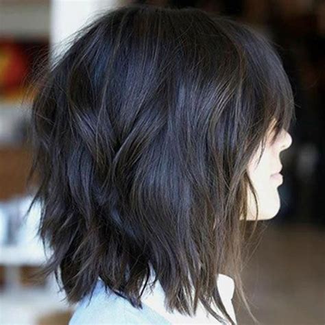 Woman With Shaggy Layered Bob Curlybobhairstyles Shaggy Bob Hairstyles