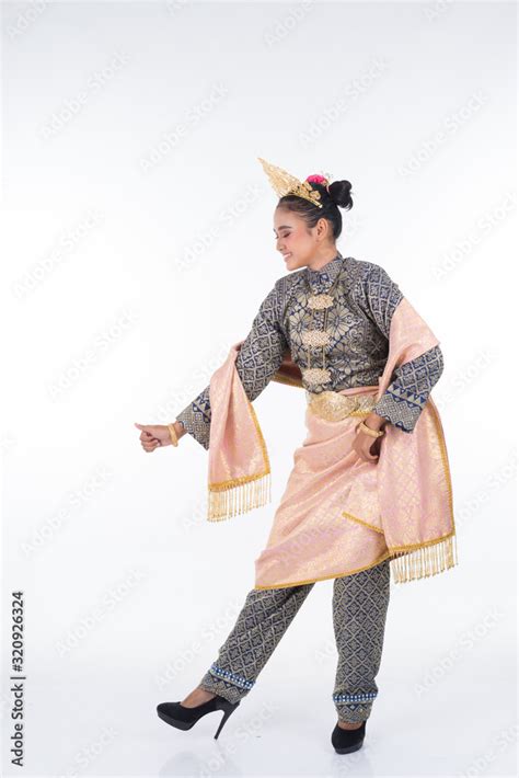 An Attractive Malaysian Traditional Female Dancer Performing A Cultural