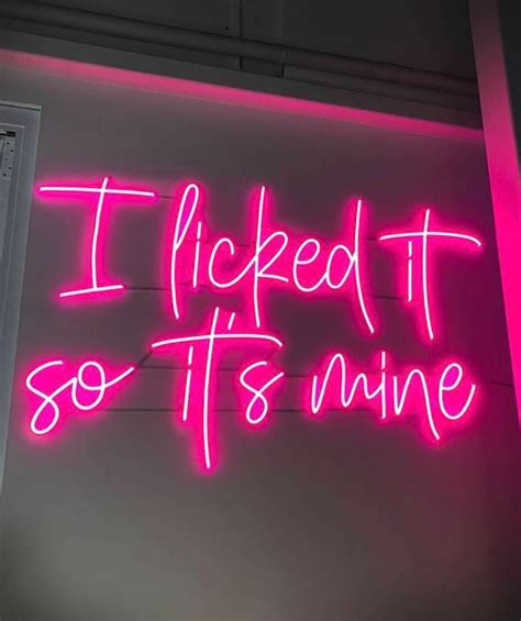 A Neon Sign That Says I Kicked It So Its Mine On The Wall