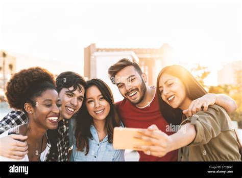 Group Multiracial Friends Taking Selfie With Mobile Smartphone Outdoor