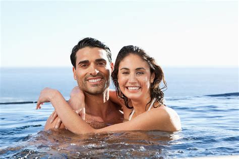 Couple Having Fun In Swimming Pool Stock Image Image Of Couple Holiday 27705991