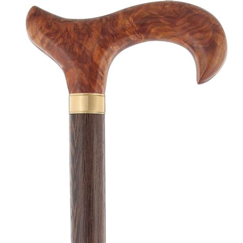 A Wooden Walking Stick With A Metal Handle On Its End And Wood Grained