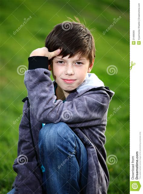 27:45 two childhood friends are going to plow! Boy In Jeans Sits On A Grass Royalty Free Stock Images ...
