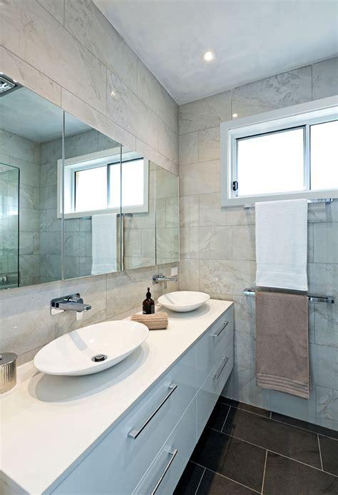Many are opting for using the same white marble tile throughout the bathroom, but mixing up the shapes on the floors, walls and shower area. 19 Tricks to Make a Small Bathroom Look Bigger - First Choice Warehouse
