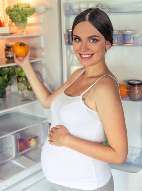 Pregnant Woman In The Kitchen Stock Image Image Of Happy Kitchen 75776163