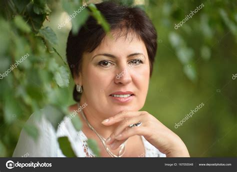 Portrait Of Beautiful Mature Woman Stock Photo By Aletia