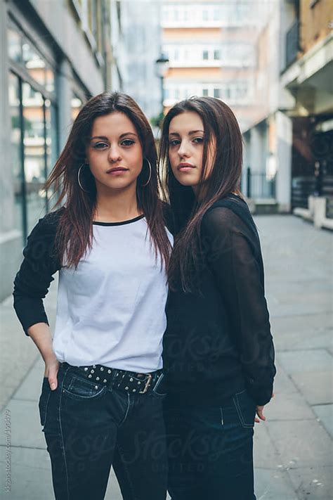 Twin Teenage Girls Outdoors In London By Kkgas Stocksy