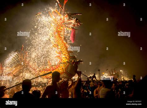 Chinese Entertainers Perform A Fire Dragon Dance To Celebrate The