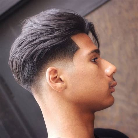 25 Low Fade Haircuts For Stylish Guys December 2022 Update Long Hair On Top Taper Fade