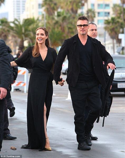 Angelina Jolie Flashes Her Jolie Leg And Spanks Brad Pitt S Butt Brad Pitt And Angelina Jolie