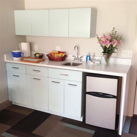 Welcome to rta kitchen cabinets online. Vintage GE kitchen cabinets installed with a modern twist - I love it!