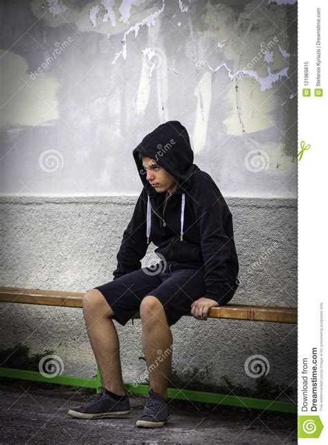 Little Boy Sad Sitting Alone At School Stock Image Image