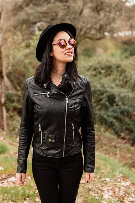 pretty brunette girl with leather jacket stock image image of park perfect 88181119