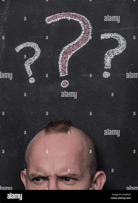Confused Man And Question Marks Stock Photo Alamy