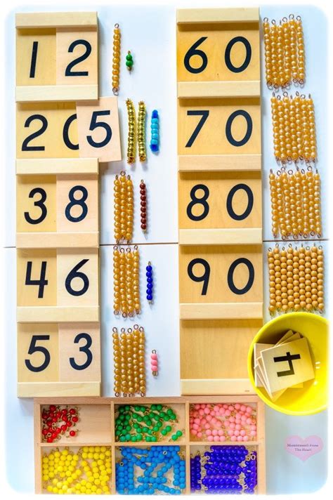 An Assortment Of Beads And Numbers In Wooden Boxes On A White Surface With A Yellow Bin