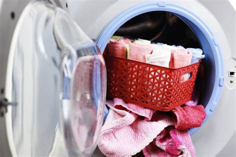 Premium Photo Put Cloth In Washer
