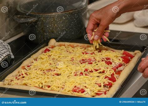 Woman Prepares Pizza With Cheese Tomatoes And Chicken Ham Woman Rubs