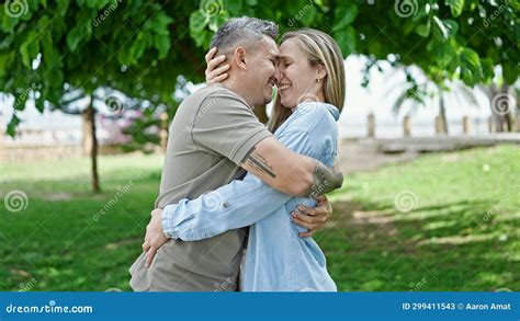 Man And Woman Couple Hugging Each Other Smiling At Park Stock Image Image Of Fashion Sunny