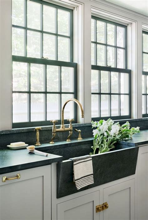 Eclectic kitchen home decor kitchen interior design kitchen new kitchen home kitchens kitchen dining modern kitchens kitchen ideas farmhouse it's a modern english farmhouse that perfectly balances crisp clean lines and soft traditional textures. 67+ Cool Modern Farmhouse Kitchen Sink Decor Ideas