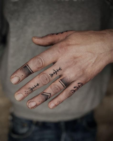 Interesting Finger Tattoos For Men