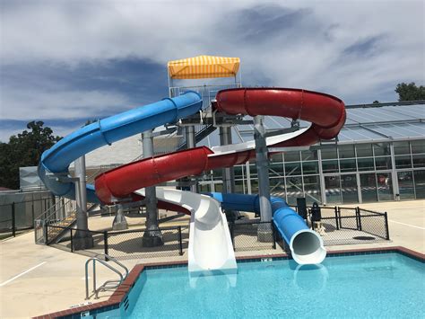 Swimmers can take advantage of the many features such as the large zero depth area. POCAHONTAS AQUATIC CENTER, POCAHONTAS WATER PARK