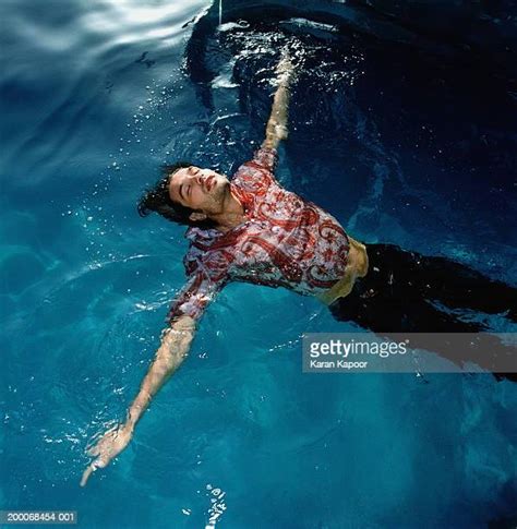 Fully Clothed Pool Bildbanksfoton Och Bilder Getty Images