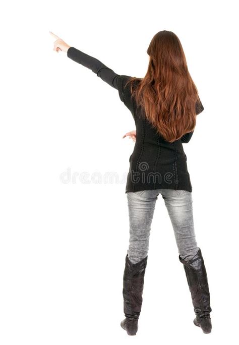 Back View Of Pointing Woman Beautiful Blonde Girl In Coat Stock Image